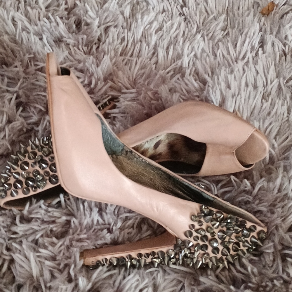 Peep toe spikes heels